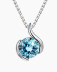 Silver necklace with a blue aquamarine gemstone pendant on a white background