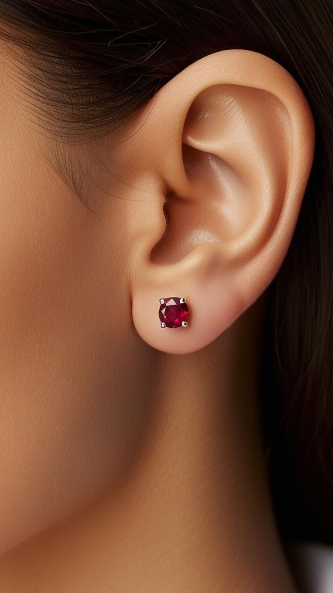 lady wearing silver gemstone earrings