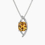 Silver pendant with a yellow gemstone on a white background