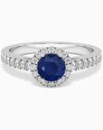 Classic round sapphire halo ring in sterling silver