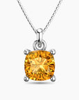 Cushion-cut citrine pendant in sterling silver with a box chain, featuring a warm golden-yellow gemstone in a four-prong setting.