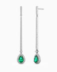 Sterling silver pear-shaped emerald dangle earrings with a 5 × 7 mm gemstone and 6 cm chain drop.