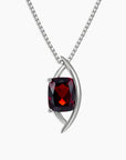 Sterling silver pendant necklace with cushion-cut natural garnet in a contemporary globe-style setting on a box chain.