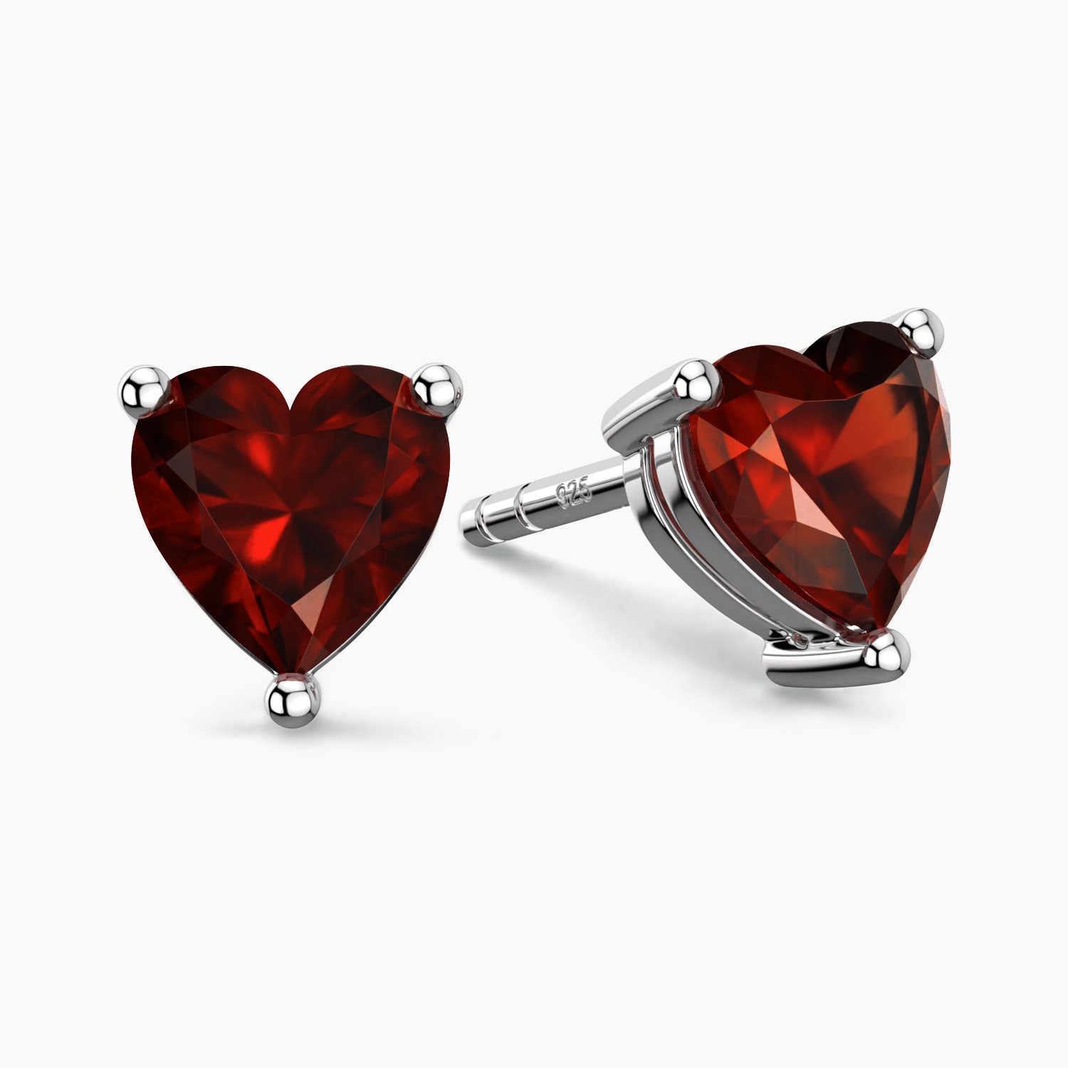 garnet stud earrings in silver heart shape