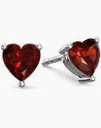 garnet stud earrings in silver heart shape