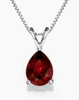 Pear-shaped garnet pendant necklace in sterling silver with box chain