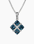 London Blue Topaz Cluster Pendant featuring four cushion-cut topaz stones set in rhodium-plated sterling silver with box chain.

