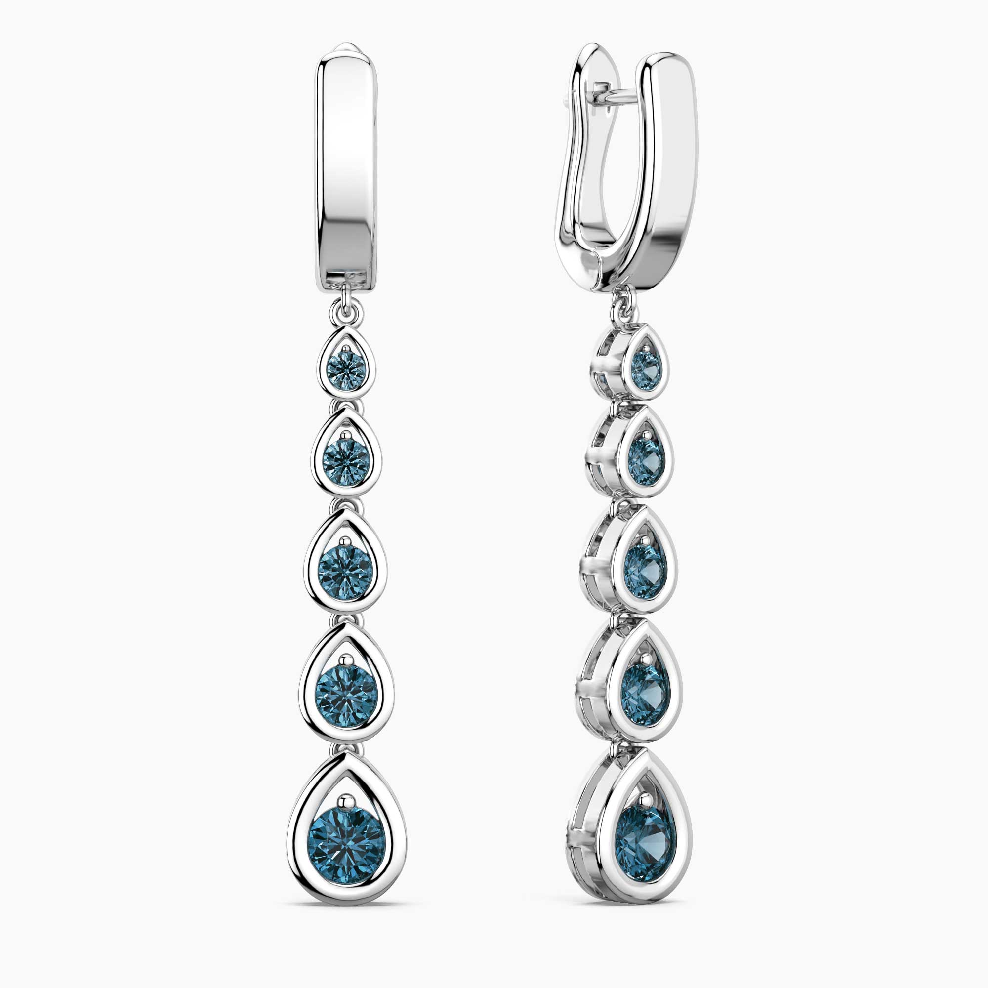 Pair of silver earrings with blue topaz gemstones on a white background