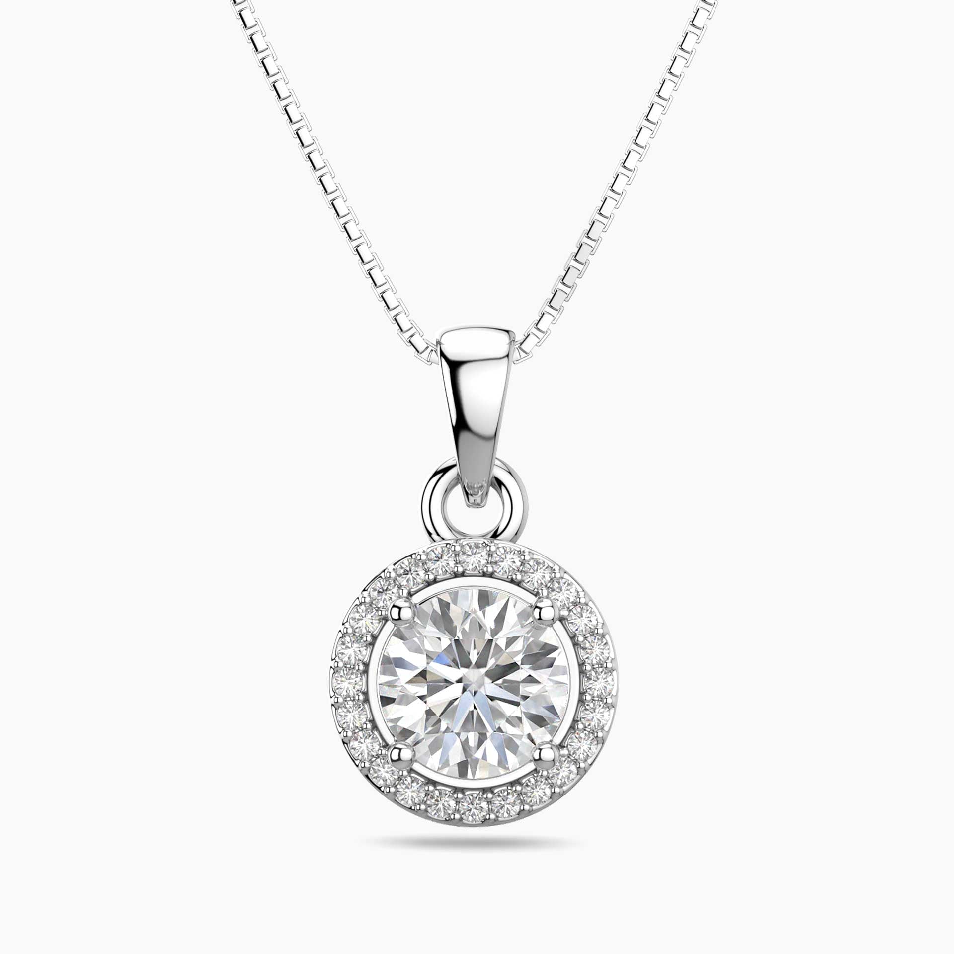 Silver necklace with a round moissanite diamond pendant on a white background