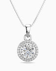 Silver necklace with a round moissanite diamond pendant on a white background