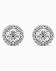 Pair of moissanite stud earrings on a white background