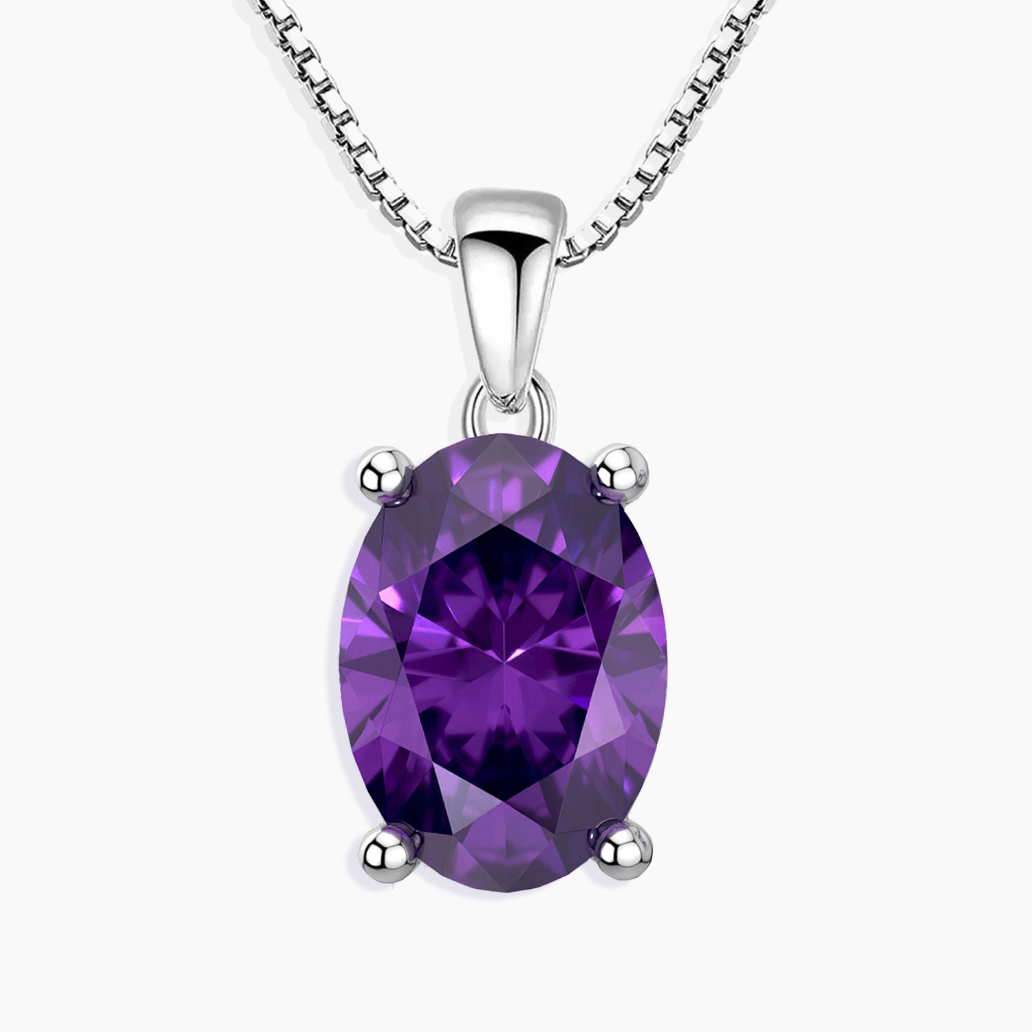 oval cut garnet necklace with light background