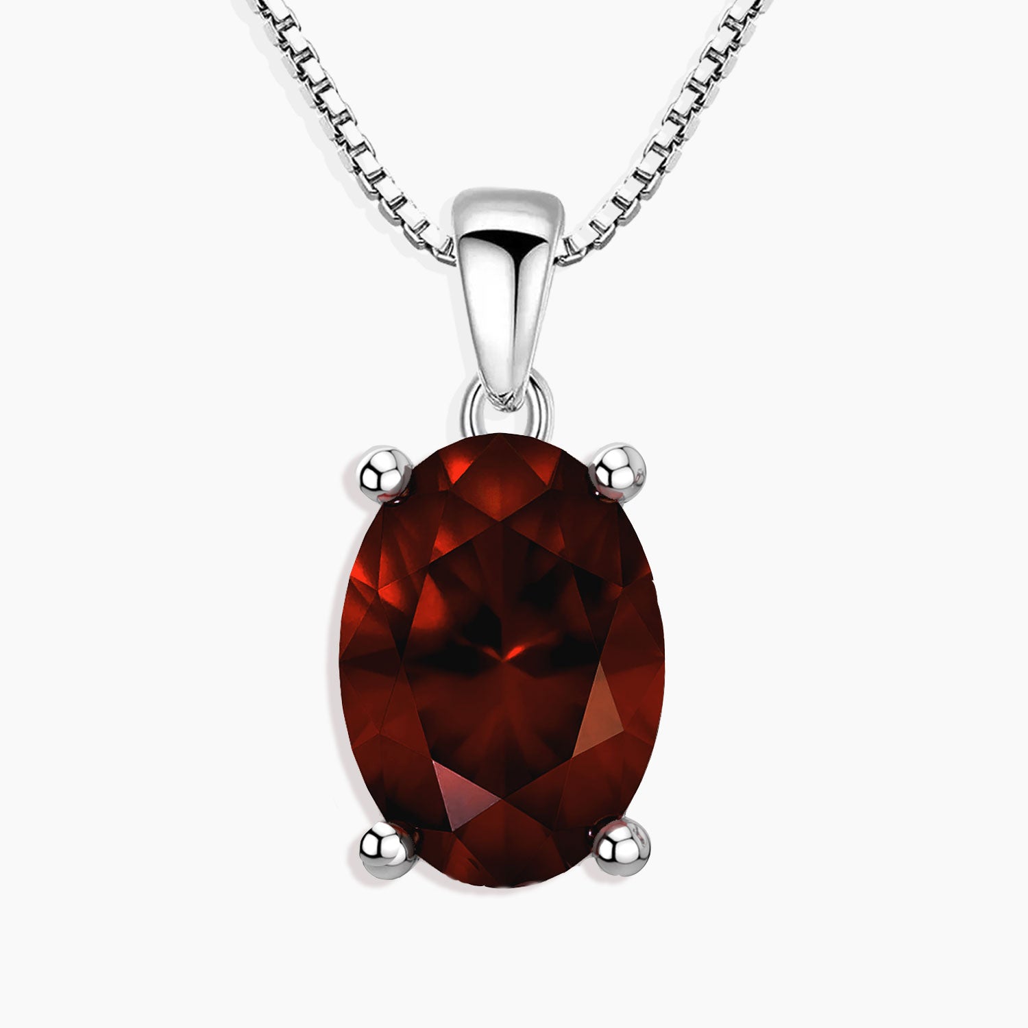 oval cut garnet necklace with light background