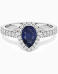 Pear shape blue sapphire halo ring in sterling silver