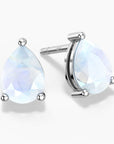 White opal pear stud earrings with side view in silver.