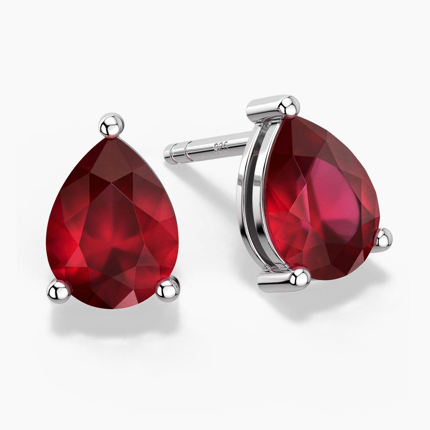 Ruby pear stud earrings in silver – front and side view.

