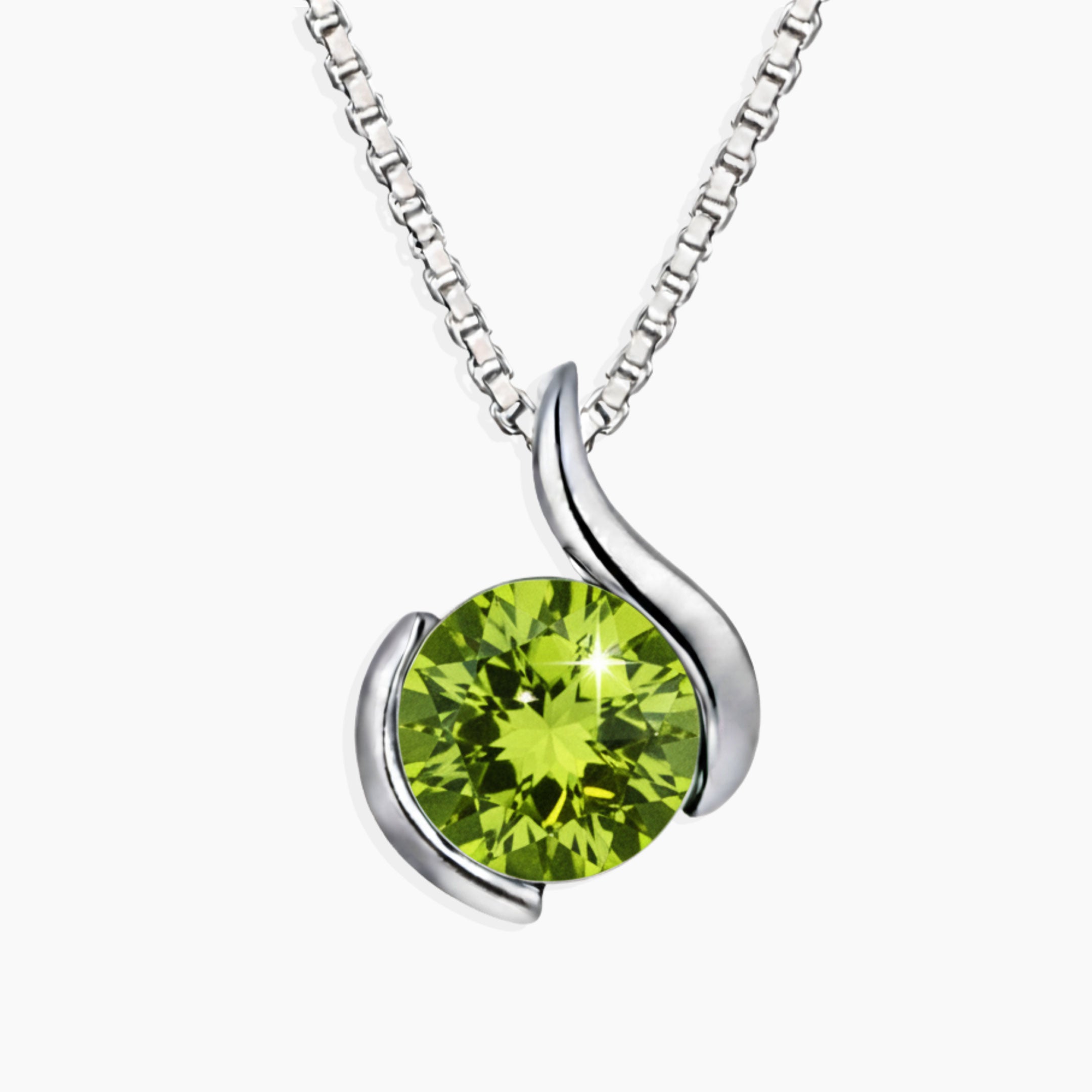 Silver necklace with a green peridot gemstone pendant on a white background