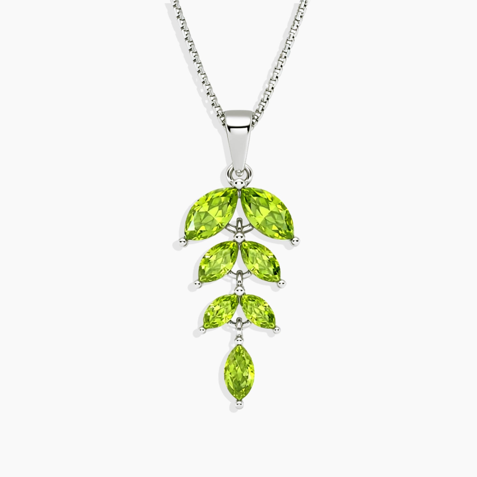 Peridot marquise cut leaf necklace with  green gemstones on a white background