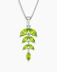 Peridot marquise cut leaf necklace with  green gemstones on a white background