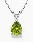 Elegant pear-shaped peridot pendant in sterling silver on a fine box chain.
