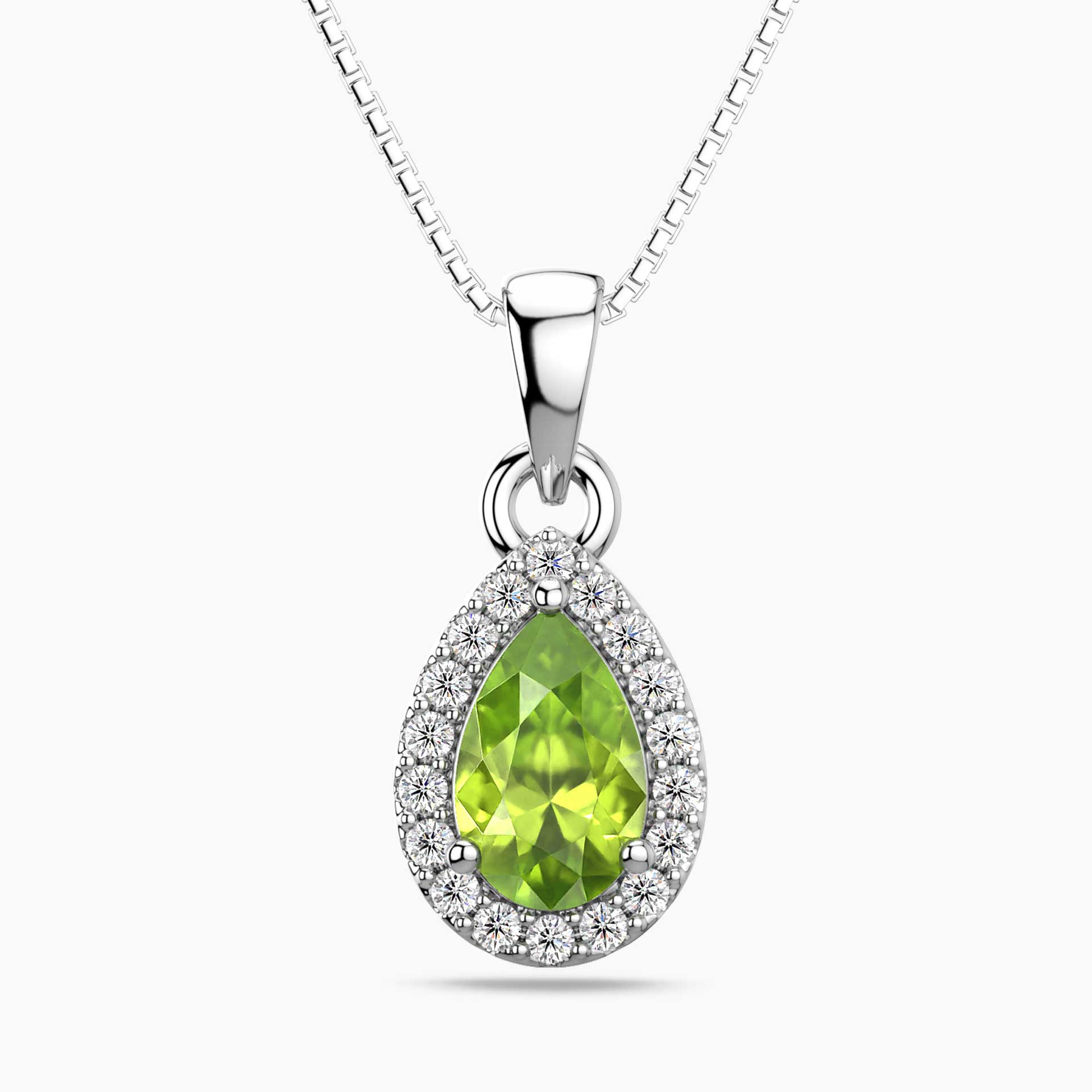 Silver pendant with a green peridot gemstone on a white background