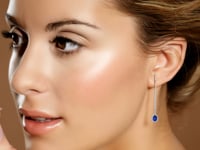 video of sapphire dangle earrings on model