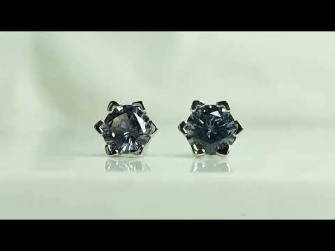 Video preview of Alexandrite hexagon earrings showing gemstone colour change in light