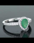Video preview of the Irosk Pear-Cut Emerald Halo Ring, featuring its pear-cut emerald and shimmering CZ halo.