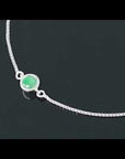 Video thumbnail of the sterling silver emerald bracelet showing the adjustable box chain and green gemstone.