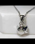 Video preview thumbnail showing the 1ct Moissanite Solitaire Pendant’s sparkle and sterling silver setting in motion.