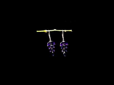 video showcasing amethyst leaf earrings in dark background