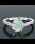 video of opal oval ring with halo