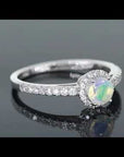 video of round cut opal ring