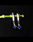 video of sapphire round hoops