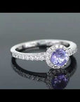 360 degree view video of round cut tanzanite ring