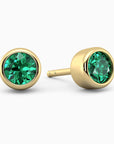 18K gold-plated sterling silver stud earrings with round-cut emeralds on a white background.
