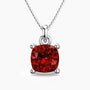 Cushion-cut ruby pendant in sterling silver with a box chain, showcasing a deep red gemstone in a classic four-prong setting.