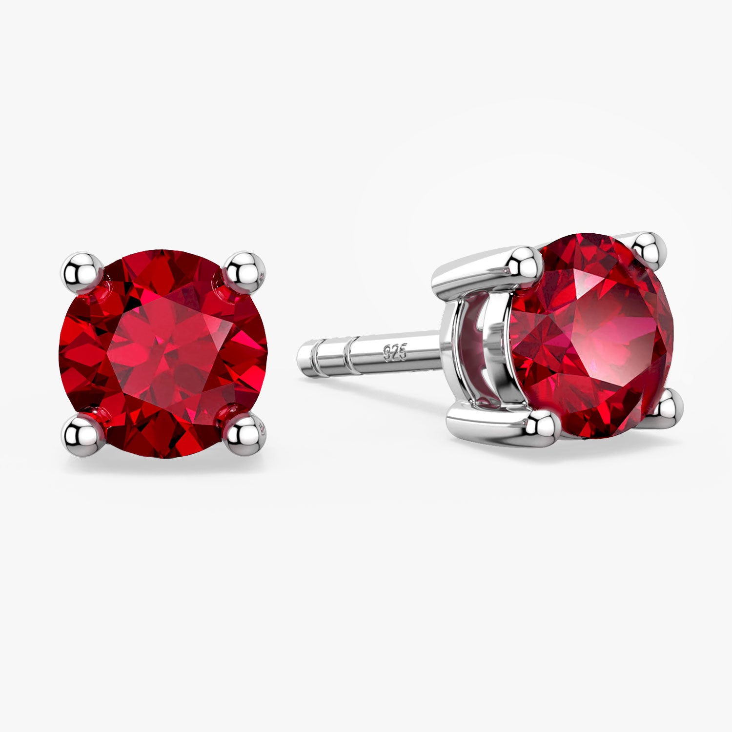 round shape ruby studs on white background