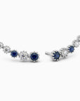Climber style sapphire earrings in rhodium-plated silver