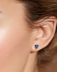 Close-Up of Lab-Created Blue Sapphire Heart-Shaped Stud Earrings
