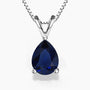 Pear-shaped sapphire pendant necklace in sterling silver with box chain and V-shaped bail.