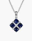 Sapphire Cluster Pendant with four cushion-cut natural sapphires set in rhodium-plated sterling silver on a 45 cm box chain.