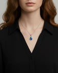 Pear Blue Topaz Pendant with Moissanite Halo | Irosk Australia