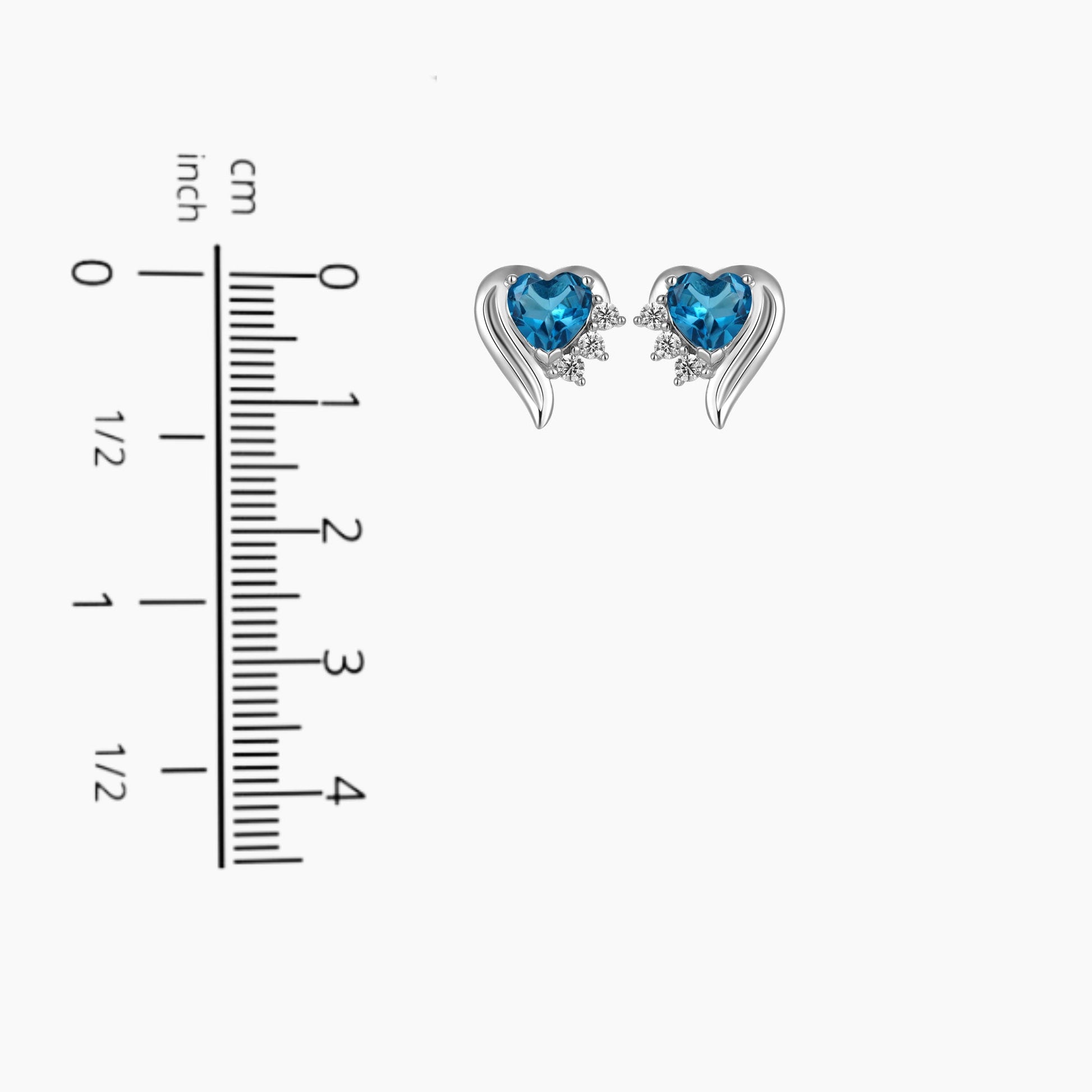 "London Blue Topaz Heart-Shaped Stud Earrings with Zirconia displayed next to a scale for size comparison