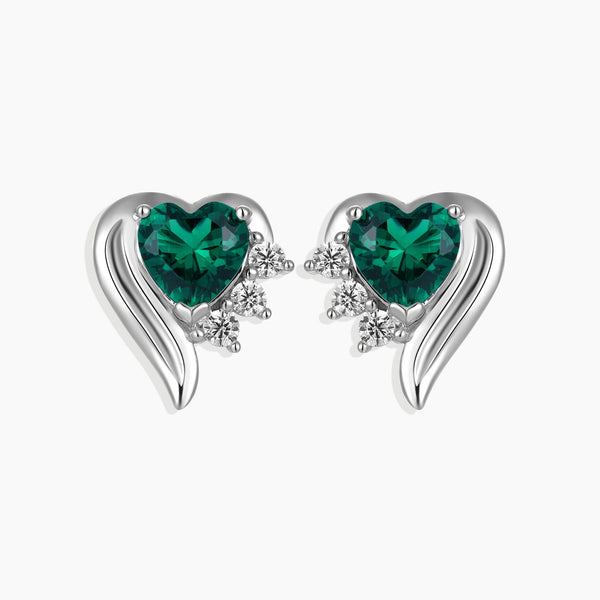 Front view of silver emerald heart shape stud earrings