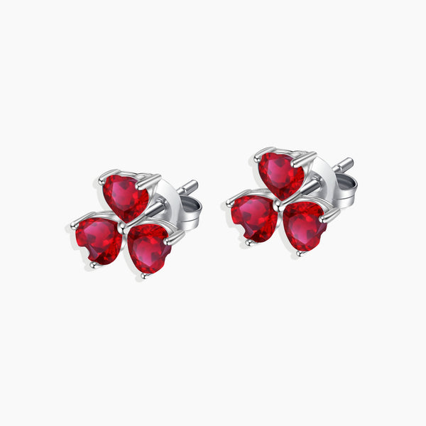 Sterling Silver Flower-Shaped Ruby Stud Earrings - Effortless elegance in bloom.