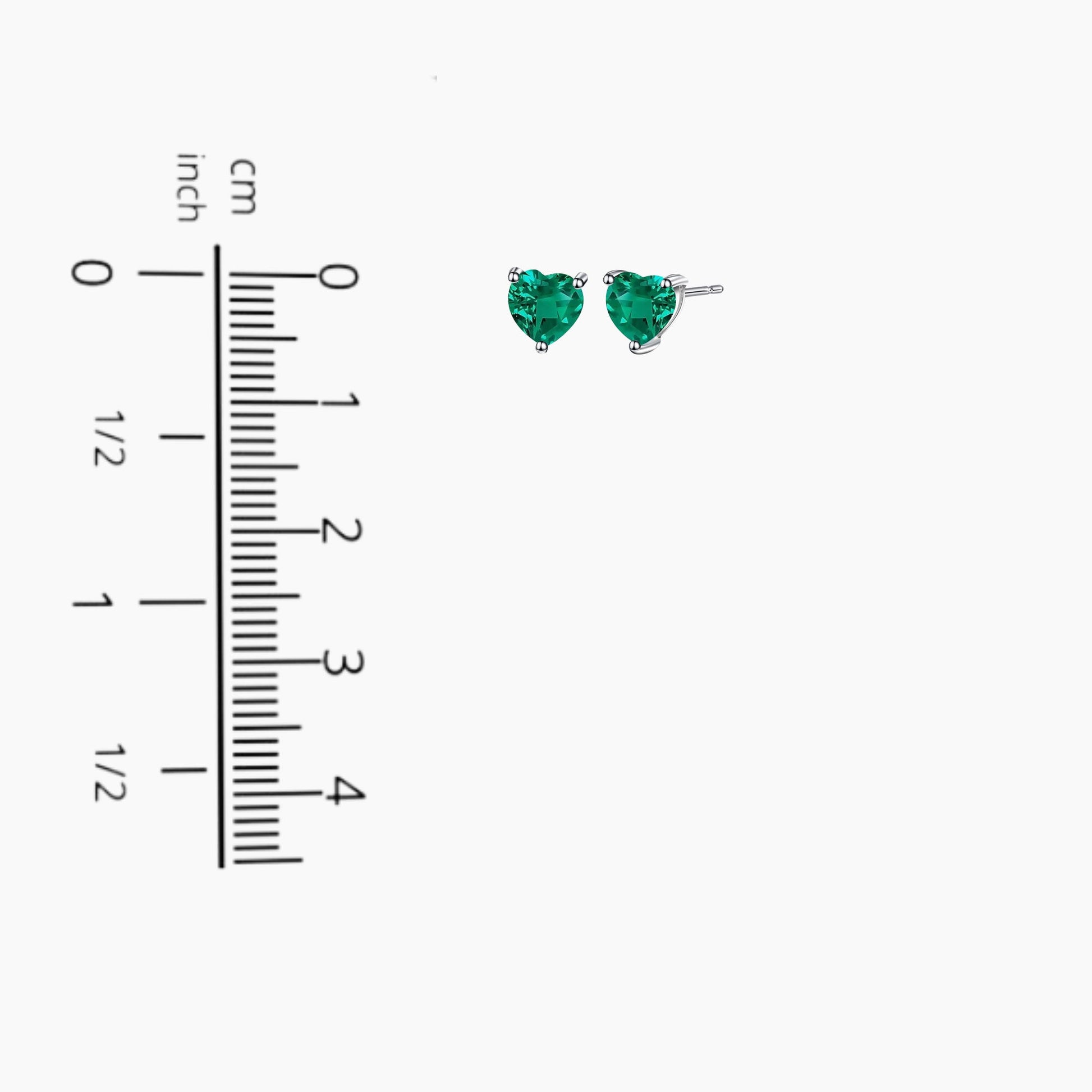 Silver emerald simple heart shape stud earrings next to scale for size comparison