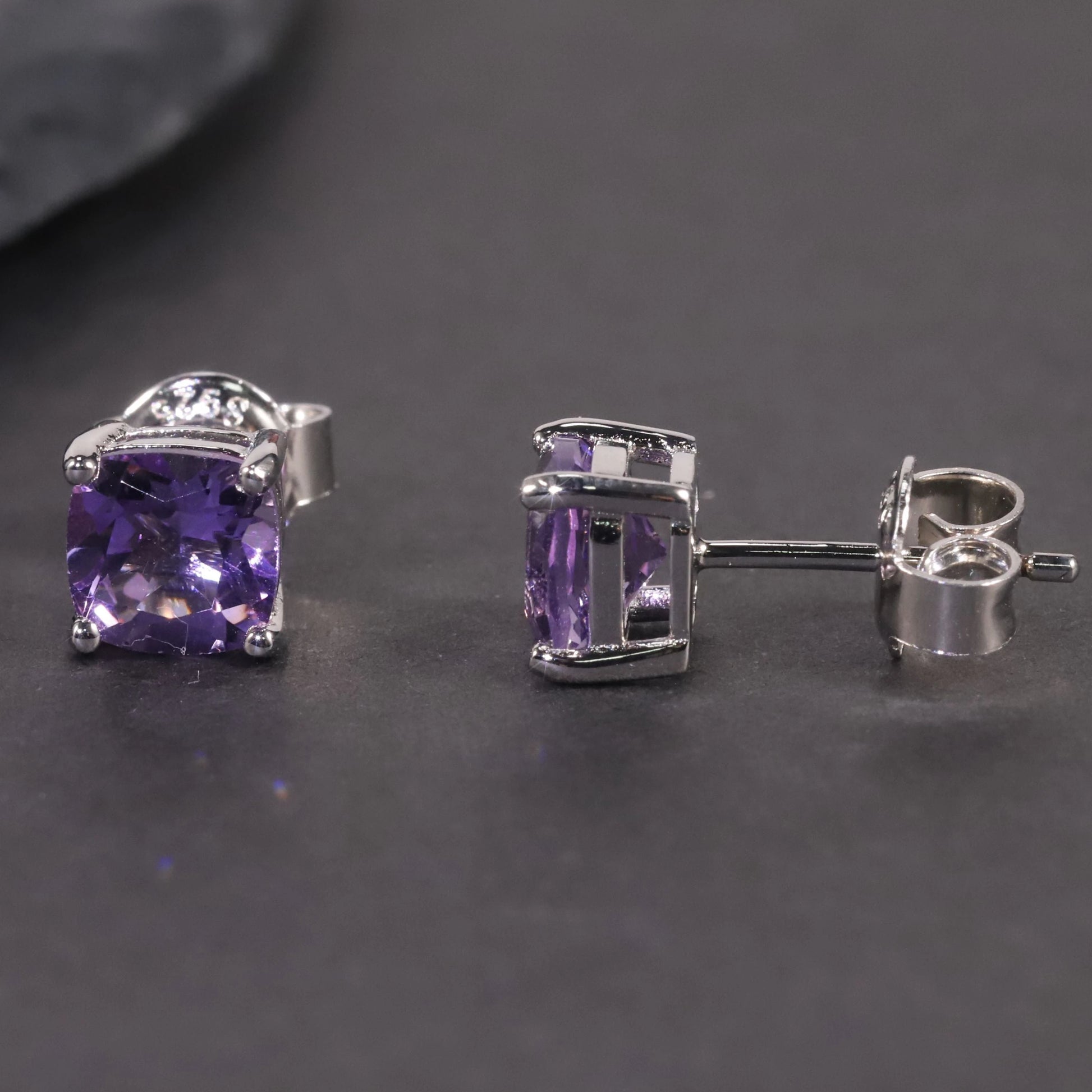 front and side view of amethyst cushion cut studs
