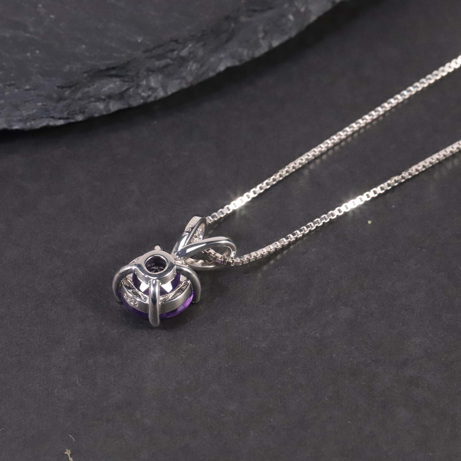 Back view of the Round Shape Amethyst Pendant, showcasing the smooth and polished finish of the sterling silver setting.