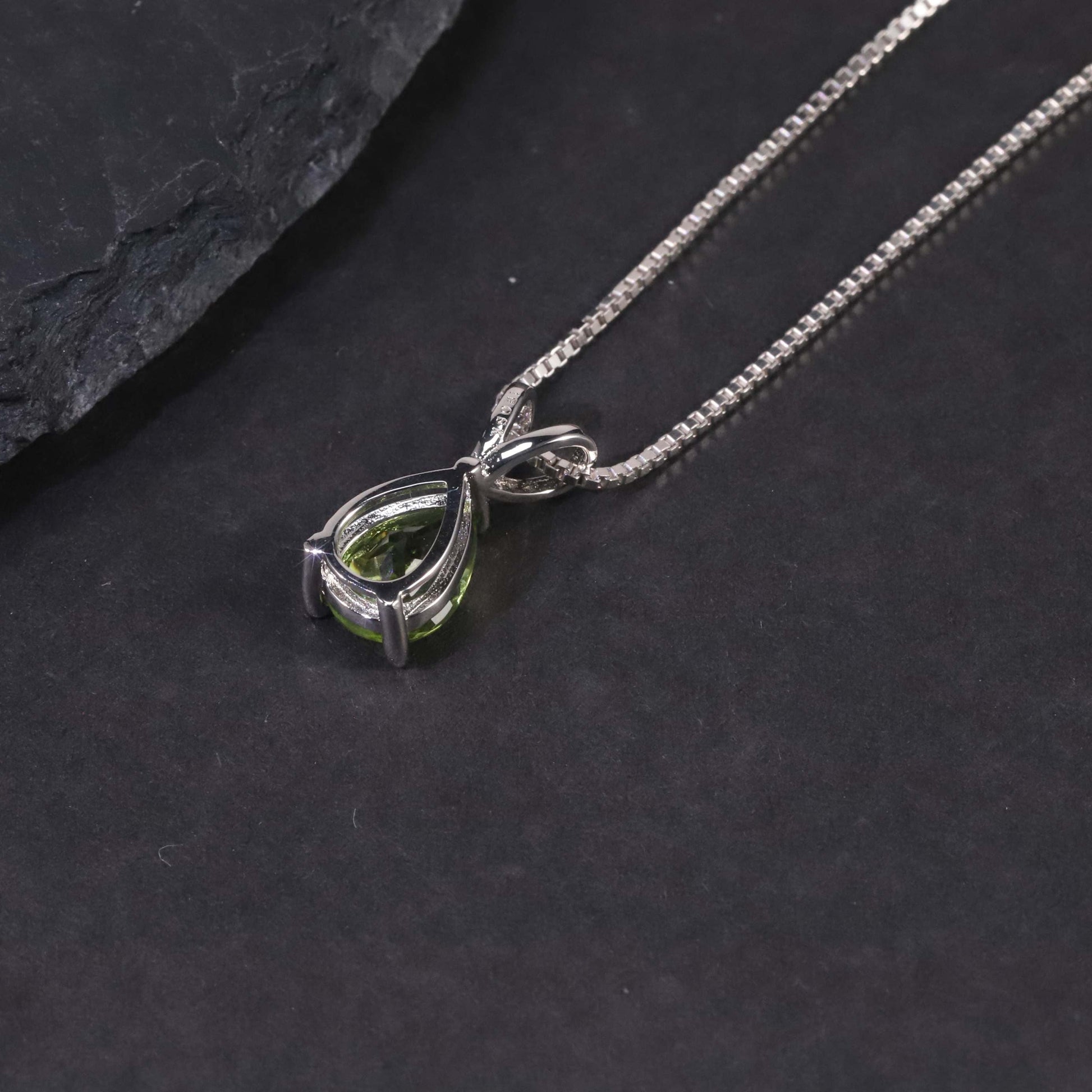 Back Side Photo of the Piece: Detailed View of Peridot Pear Cut Pendant